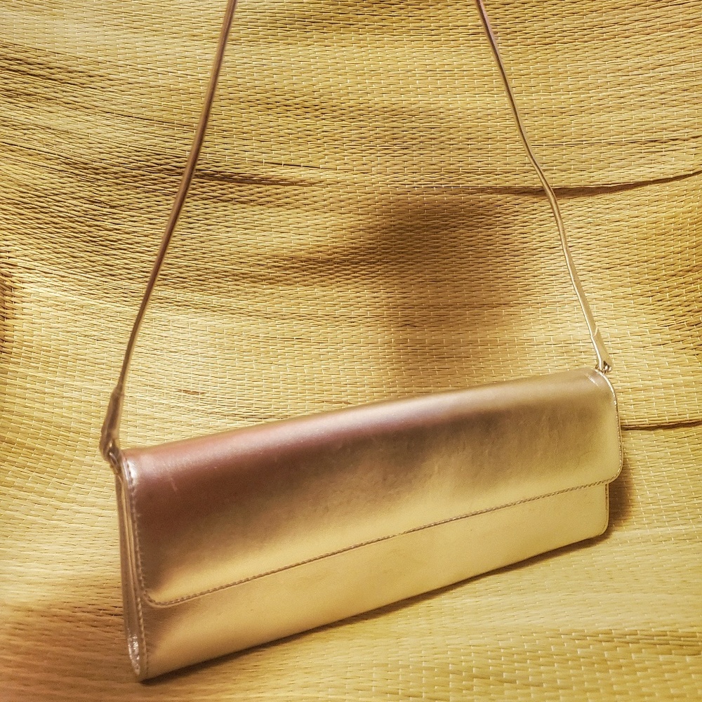 Stuart Weitzman Metallic Clutch in Silver Leather